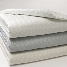 If the idea of less is more means simplicity and clarity then it is surely reflected in this modern rendition inspired by classic French canning. This fine layering piece combines the subtle sheen of silk satin with the washability of cotton. Simply finished with 0.5 bound edge on the coverlet and 0.5 flat satin piping on the standard and Euro shams. All pieces reverse to the cotton/silk satin. Offered in a range of colors, the Cross Diamond- coverlet is the perfect complement to any bedding ensemble. If the idea of less is more means simplicity and clarity then it is surely reflected in this modern rendition inspired by classic French canning. This fine layering piece combines the subtle sheen of silk satin with the washability of cotton. Simply finished with 0.5 bound edge on the coverlet and 0.5 flat satin piping on the standard and Euro shams. All pieces reverse to the cotton/silk satin. Offered in a range of colors, the Cross Diamond- coverlet is the perfect complement to any bedding ensemble.