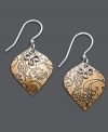 Add a little texture to your look. Jody Coyote's teardrop-shaped earrings feature a bronze charm with an intricate, engraved design. Set in sterling silver with sterling silver swirl accent. Approximate drop: 1 inch.