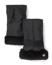 A genuine shearling trim lends a plush finish to these fingerless gloves from UGG® Australia. A genuine shearling trim lends a plush finish to these fingerless gloves from UGG® Australia.