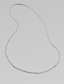 Delicate, faceted glass beads compliment the supple metallic leather cord. Glass beadsLeather cordLength, about 53½Slip-on styleImported 