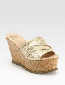 Ruched upper in shimmering metallic suede, grounded by a natural cork wedge and platform. Cork wedge, 4 (100mm)Cork platform, 2 (50mm)Compares to a 2 heel (50mm)Metallic suede upperLeather liningRubber solePadded insoleImported Ruched upper in shimmering metallic suede, grounded by a natural cork wedge and platform. Cork wedge, 4 (100mm)Cork platform, 2 (50mm)Compares to a 2 heel (50mm)Metallic suede upperLeather liningRubber solePadded insoleImported
