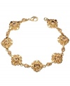 Fabulous for fall. Enhance your wardrobe with seasonal style in the form of this gorgeous topaz-hued bracelet from Monet. Featuring a delicate floral motif, it's crafted in gold tone mixed metal. Approximate length: 7-1/2 inches.