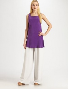 A phenomenal silk style with a chic, high-waist design and well-placed pleats for high-fashion appeal. High-waist designPleated frontSide zipperBack waist dartsInseam, about 32SilkDry cleanImported Model shown is 5'11 (180cm) wearing US size 4. 