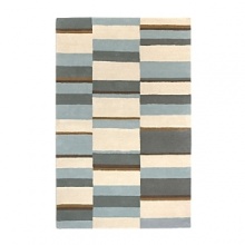 Modern geometric design that is hand-tufted in a tonal color-block pattern. Made of 100% New Zealand wool, cotton backed and edged. Modern geometric design that is hand-tufted in a tonal color-block pattern. Made of 100% New Zealand wool, cotton backed and edged.