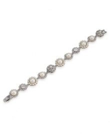 The perfect combination of elegance and grace. This frosty white bracelet by Carolee features glass crystal stones and glass pearls. Crafted in rhodium-plated mixed metal. Approximate length: 7-3/4 inches. The perfect combination of elegance and grace. This frosty white bracelet by Carolee features glass crystal stones and glass pearls. Crafted in rhodium-plated mixed metal. Approximate length: 7-3/4 inches.