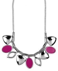 A colorful infusion. Nine West's pretty necklace features leaf-shaped charms and fuchsia enamel ovals for a bright pop of color. Set in silver tone mixed metal. Approximate length: 16 inches + 2-inch extender. Approximate drop length: 1 inch. Approximate drop width: 5-3/4 inches. A colorful infusion. Nine West's pretty necklace features leaf-shaped charms and fuchsia enamel ovals for a bright pop of color. Set in silver tone mixed metal. Approximate length: 16 inches + 2-inch extender. Approximate drop length: 1 inch. Approximate drop width: 5-3/4 inches.