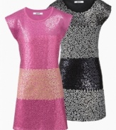 She's all the glitters in this fabulous party dress by DKNY.