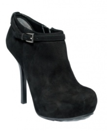 We can't decide which version of GUESS' Gracia ankle boots we like better: Solid suede or lizard-embossed leather with a contrasting strap detail. Either way, they're sure to look stylish! With a 4-1/2 stacked heel and inner zipper enclosure. We can't decide which version of GUESS' Gracia ankle boots we like better: Solid suede or lizard-embossed leather with a contrasting strap detail. Either way, they're sure to look stylish! With a 4-1/2 stacked heel and inner zipper enclosure.