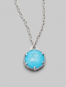 From the Eclipse Collection. A vividly colored, richly faceted turquoise sits in a sterling silver pronged setting with a graceful fluted texture and accents of sparkling white sapphire. Turquoise White sapphire Sterling silver Chain length, about 17 Pendant diameter, about ¾ Lobster clasp Imported From the Eclipse Collection. A vividly colored, richly faceted turquoise sits in a sterling silver pronged setting with a graceful fluted texture and accents of sparkling white sapphire. Turquoise White sapphire Sterling silver Chain length, about 17 Pendant diameter, about ¾ Lobster clasp Imported