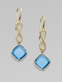 From the Cushion Collection. Faceted blue topaz is suspended from an elegant figure eight of cabled 18k yellow gold.Blue topaz 18k yellow gold Length, about 1¼ French wire Imported