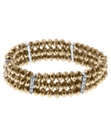 Perfectly paired. Both copper tone and silver tone mixed metal add a luxe look to this stylish stretch bracelet from 2028. Embellished with sparkling crystals as well as glass beads, its stretch design makes it an effortless, comfortable choice. Approximate length: 7 inches. Perfectly paired. Both copper tone and silver tone mixed metal add a luxe look to this stylish stretch bracelet from 2028. Embellished with sparkling crystals as well as glass beads, its stretch design makes it an effortless, comfortable choice. Approximate length: 7 inches.