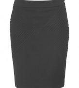 Luxurious skirt in black stretch wool - genius mix of cool, sexy and classic - slim waistband - darts shape pointy triangles, the effect: an intricate appeal and a super slim silhouette - typical pencil skirt, figure hugging and comfortable due to stretch content - classic knee length - elegant basic skirt, versatile to combine - pair with a blouse and pumps, a tunic and sandals or a jeans jacket and gladiator booties