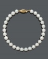 Embrace natural beauty and refinement with elegant pearls. Bracelet features AA Akoya cultured pearls (6-6-1/2 mm) and a 14k gold clasp. Approximate length: 8 inches.