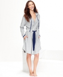 Stay cozy this season in this french terry robe by Tommy Hilfiger. It features contrasting trim along the sleeve edges and on the drawstring closures with pockets on both sides. Stay cozy this season in this french terry robe by Tommy Hilfiger. It features contrasting trim along the sleeve edges and on the drawstring closures with pockets on both sides.