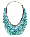Crazy for colorblocking. Snap up this latest trend and wear it well with INC International Concepts statement-making style. Turquoise and teal-colored plastic beads and sparkling glass accents mix for an ultra-chic look. Crafted in gold-plated mixed metal. Approximate length: 20 inches. Approximate drop: 4 inches.