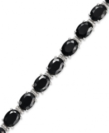 Stand out. Oval-cut onyx gemstones (18-3/4 ct. t.w.) and sparkling diamond accents adorn this chic bracelet. Crafted in sterling silver. Approximate length: 7-1/2 inches. Stand out. Oval-cut onyx gemstones (18-3/4 ct. t.w.) and sparkling diamond accents adorn this chic bracelet. Crafted in sterling silver. Approximate length: 7-1/2 inches.