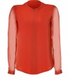 This vibrant rust-tinged silk top from Tibi is perfect for the festive season - Narrow and feminine with a round neck, long transparent sleeves, concealed zipper - Soft and flattering - Stylish and sexy with leather pants, mini-skirts or loose, flat-front trousers