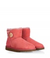 A stylish twist on a venerable classic, the UGG Australia mini Bailey Button boot is a welcome colorful addition to your cold weather casual wardrobe - Crafted from twin-faced sheepskin and featuring exposed seams, reinforced heel, traction outsole, signature UGG label, wooden button and elastic band closure, fleece-lined for superior warmth and comfort - Newer, ankle-height - Truly versatile, perfect for pairing with everything from skinny jeans to yoga pants to mini-skirts