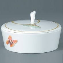 For over two centuries Raynaud has created unique Limoges porcelain, with a marked preference for relief shapes and generously colored and gilt decorations. Metamorphoses is a striking pattern of red and gold with a butterfly motif. For over two centuries Raynaud has created unique Limoges porcelain, with a marked preference for relief shapes and generously colored and gilt decorations. Metamorphoses is a striking pattern of red and gold with a butterfly motif.