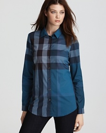 A cool color palette offers an edgy update to the classic Burberry Brit shirt, emblazoned with an oversized check print for a modern finish. Roughen up the sleek style with a boxy leather jacket. A cool color palette offers an edgy update to the classic Burberry Brit shirt, emblazoned with an oversized check print for a modern finish. Roughen up the sleek style with a boxy leather jacket.