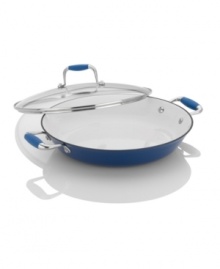 Designed by Michelle Bernstein, one of our pro chefs from The Culinary Council, this cast iron professional combines unbeatable enamel style with incredible performance. The perfect assistant for searing meats, sauteing veggies, tossing up that perfect paella and conquering every dish with ease, this versatile chef's pan features a resilient nonstick interior, sleek silicone handles and a lightweight design that create masterpiece meals that go straight from oven to table. 1-year warranty. Designed by Michelle Bernstein, one of our pro chefs from The Culinary Council, this cast iron professional combines unbeatable enamel style with incredible performance. The perfect assistant for searing meats, sauteing veggies, tossing up that perfect paella and conquering every dish with ease, this versatile chef's pan features a resilient nonstick interior, sleek silicone handles and a lightweight design that create masterpiece meals that go straight from oven to table. 1-year warranty.