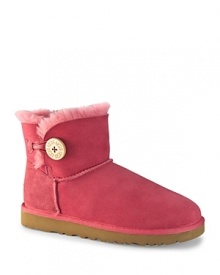 Introducting the Mini Bailey bootie from UGG® Australia--a short design featuring a subtle button detail. Introducting the Mini Bailey bootie from UGG® Australia--a short design featuring a subtle button detail.