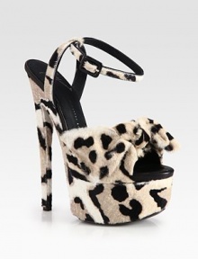 Trend-worthy design of lush calf hair with a daring leopard print and big bow, lifted by an ultra-high heel and platform. Self-covered heel, 6½ (165mm)Covered platform, 2¼ (60mm)Compares to a 4¼ heel (110mm)Leopard print calf hair upperAdjustable ankle strapLeather liningLeather and rubber solePadded insoleMade in Italy Trend-worthy design of lush calf hair with a daring leopard print and big bow, lifted by an ultra-high heel and platform. Self-covered heel, 6½ (165mm)Covered platform, 2¼ (60mm)Compares to a 4¼ heel (110mm)Leopard print calf hair upperAdjustable ankle strapLeather liningLeather and rubber solePadded insoleMade in Italy