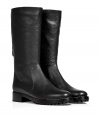 Dont let cold weather foil your stylelook chic and stay warm in these grip sole leather boots from Sergio Rossi - Rounded toe, chunky low heel, mid-shaft length, sturdy grip sole, textured leather, back exposed zip closure - Wear with skinny jeans, a mini-skirt, or leggings