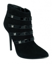 Hot step through cold winter weather. Turn up the heat on a pencil skirt or little black dress with the Fidela ankle booties by GUESS, featuring patent leather straps with metal pyramid studs. Hot step through cold winter weather. Turn up the heat on a pencil skirt or little black dress with the Fidela ankle booties by GUESS, featuring patent leather straps with metal pyramid studs.
