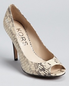 In genuine snakeskin, these KORS Michael Kors pumps exude modern luxury. In genuine snakeskin, these KORS Michael Kors pumps exude modern luxury.