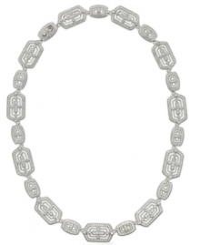 Eliot Natori combines style and substance in this decorated collar necklace. Crafted from rhodium-plated brass, the necklace features crystal accents to stunning effect. Approximate length: 16 inches. Eliot Natori combines style and substance in this decorated collar necklace. Crafted from rhodium-plated brass, the necklace features crystal accents to stunning effect. Approximate length: 16 inches.