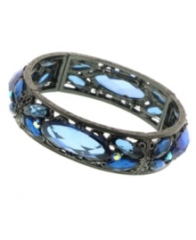 Total tranquility: In soothing shades of light blue, 2028's stretch bracelet will complement a variety of looks in your wardrobe. Crafted in hematite tone mixed metal with plastic stones. Bracelet stretches to fit wrist. Approximate diameter: 2-1/4 inches. Total tranquility: In soothing shades of light blue, 2028's stretch bracelet will complement a variety of looks in your wardrobe. Crafted in hematite tone mixed metal with plastic stones. Bracelet stretches to fit wrist. Approximate diameter: 2-1/4 inches.