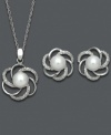 The perfect set of matching pinwheels. A cut-out spiral setting adorns this intricate jewelry set. Cultured freshwater pearls (6-7 mm) and diamond accents add shimmer and shine. Set in sterling silver. Approximate length: 18 inches. Approximate pendant drop: 7/8 inch. Approximate earrings drop: 1/2 inch.