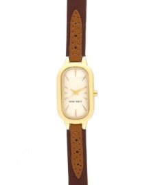 Classic style you can trust, by Nine West. Crafted of brown leather strap and oval gold tone mixed metal case. Champagne dial features gold tone applied stick indices, gold tone hour and minute hands, sweeping second hand and logo at six o'clock. Quartz movement. Limited lifetime warranty. Classic style you can trust, by Nine West. Crafted of brown leather strap and oval gold tone mixed metal case. Champagne dial features gold tone applied stick indices, gold tone hour and minute hands, sweeping second hand and logo at six o'clock. Quartz movement. Limited lifetime warranty.
