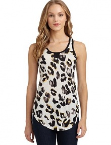 THE LOOKAllover leopard printRacerbackTHE FITAbout 24 from shoulder to hemTHE MATERIALViscose/linenCARE & ORIGINHand washImportedModel shown is 5'8 (172½cm) wearing US size Small. THE LOOKAllover leopard printRacerbackTHE FITAbout 24 from shoulder to hemTHE MATERIALViscose/linenCARE & ORIGINHand washImportedModel shown is 5'8 (172½cm) wearing US size Small.