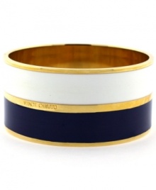 Sailor's delight. A nautical theme takes shape in the form of navy and white enamel stripes on Vince Camuto's trendy bangle bracelet. Crafted in gold tone mixed metal. Approximate diameter: 2-1/2 inches. Sailor's delight. A nautical theme takes shape in the form of navy and white enamel stripes on Vince Camuto's trendy bangle bracelet. Crafted in gold tone mixed metal. Approximate diameter: 2-1/2 inches.