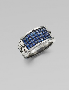 A tapered design in rhodium plated sterling silver is defined by four rows of tiny blue sapphires.Sterling silverBlue sapphiresAbout 1½ diamImported A tapered design in rhodium plated sterling silver is defined by four rows of tiny blue sapphires.Sterling silverBlue sapphiresAbout 1½ diamImported