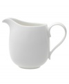 Fresh modern. Sheer white china in a clean round shape inspires simply harmonious dining. A soft fluidity and radiant glaze give this milk jug quiet elegance and lasting appeal.