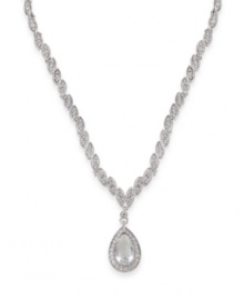 Look simply luminous in this glittering glass stone pendant by Carolee. Crafted in silver tone mixed metal. Approximate length: 16 inches + 2-inch extender. Approximate drop: 1-1/2 inches. Look simply luminous in this glittering glass stone pendant by Carolee. Crafted in silver tone mixed metal. Approximate length: 16 inches + 2-inch extender. Approximate drop: 1-1/2 inches.