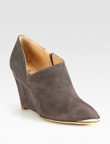 Unexpected metal inserts add polish to this architectural design of soft suede. Self-covered wedge,3½ (90mm)Suede and metal upperSide zipperLeather lining and solePadded insoleImportedOUR FIT MODEL RECOMMENDS ordering true size. 