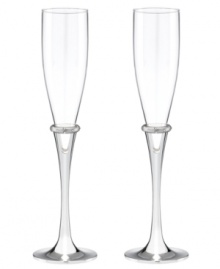 Bands of sparkling rhinestones and silver-plated stems lend modern glamor to Devotion champagne flutes, a beautiful wedding gift from Lenox. Qualifies for Rebate