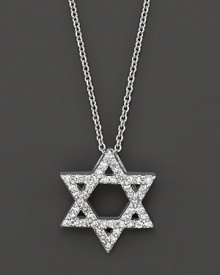 A diamond Star of David in a white gold setting. With a delicate white gold chain. A diamond Star of David in a white gold setting. With a delicate white gold chain.