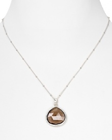 With a faceted smoky quartz pendant, Coralia Leets' 22-karat gold necklace is elegance simplified. Day or after dark, this piece slips on to give a spectrum of looks tonal sparkle. With a faceted smoky quartz pendant, Coralia Leets' 22-karat gold necklace is elegance simplified. Day or after dark, this piece slips on to give a spectrum of looks tonal sparkle.