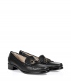 Preppy-cool with an elegant twist, these luxe loafers from Salvatore Ferragamo elevate your causal style - Classic loafer style, stitched moc toe, gold-tone Gancini logo detail, chunky heel - Pair with slim jeans and a tee or cropped trousers and a button down