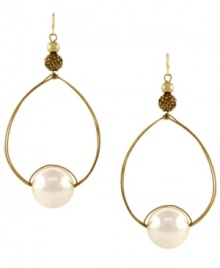 Perfectly polished. Teardrop-shaped hoops showcase luminous glass pearls. Set in gold tone mixed metal. Approximate drop: 3-1/2 inches. Perfectly polished. Teardrop-shaped hoops showcase luminous glass pearls. Set in gold tone mixed metal. Approximate drop: 3-1/2 inches.