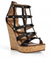 Inject high style to your warm weather look with these ultra-luxe cage sandals from Valentino - Leather cage front upper with stud embellishment, super high wedge cork heel, back zip closure - Style with a pleated maxi dress and a studded shoulder bag