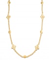 Rich, luxurious layers that can be worn long or doubled up. This chic Lauren Ralph Lauren necklace features intricate hammered discs in worn gold tone mixed metal. Approximate length: 60 inches.