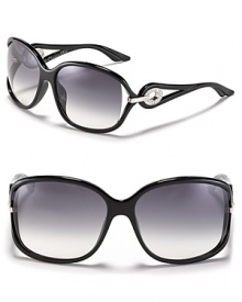 Sunglasses with style. Oversized frames with open temples and circular crystal accents from Dior. Sunglasses with style. Oversized frames with open temples and circular crystal accents from Dior.