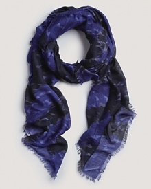 A cozy square scarf with indigo watercolor-like check print, a must-have accessory from Burberry.