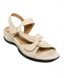 Clarks softens the classic sunny look of their Lucena sandals with draped details and asymmetrical straps. Clarks softens the classic sunny look of their Lucena sandals with draped details and asymmetrical straps.